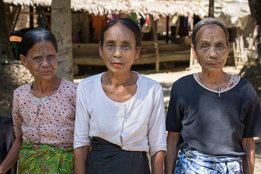 MRAUK-U, MYANMAR - JANUARY 27, 2016: The portrait of Chin women with spider tattoo. Chin people, also known as the Kukis are a number of Tibeto Burman tribal people.