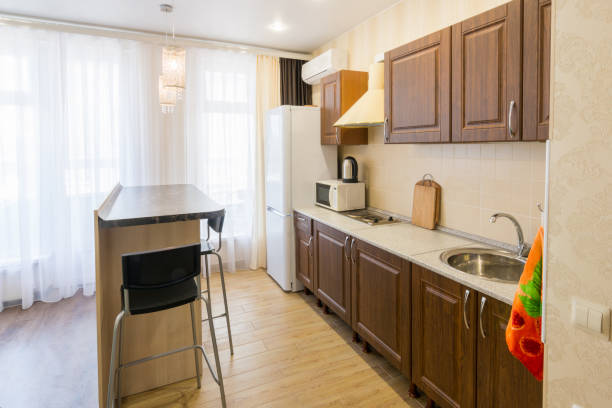 istock Kitchen interior with a bar counter in the apartment 852760278