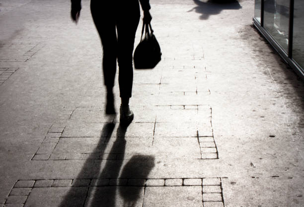 istock Woman walking in motion blur 852765116
