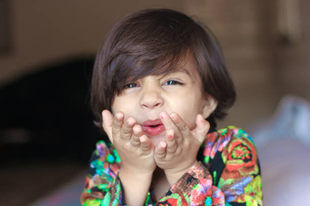 istock beautiful child outdoor , expression, smiling 852766322