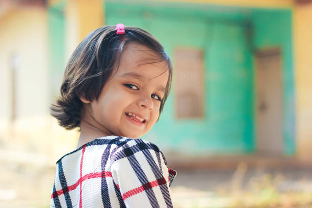 istock beautiful child outdoor , expression, smiling 852770388