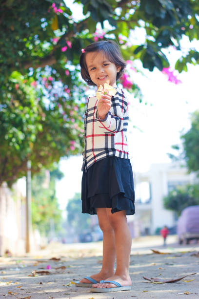 istock beautiful child outdoor , expression, smiling 852770630