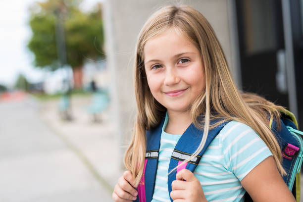 istock nine years old girl student at school 852825904