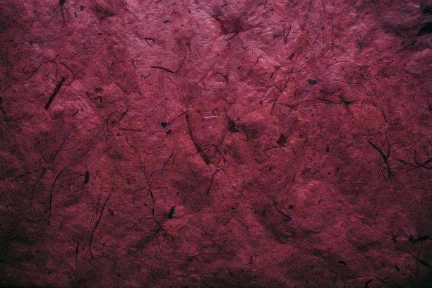 istock Abstract red texture and background for designers. Vintage paper background. Rough red texture of recycled paper. Closeup view of abstract red texture. Vintage red paper. 852826130