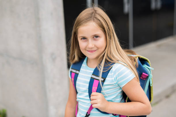 istock nine years old girl student at school 852826212