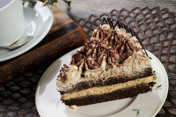 istock Cup of tea and Delicious chocolate cake with whipped cream 852826788