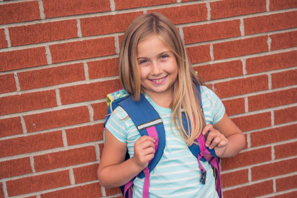 istock nine years old girl student at school 852834168
