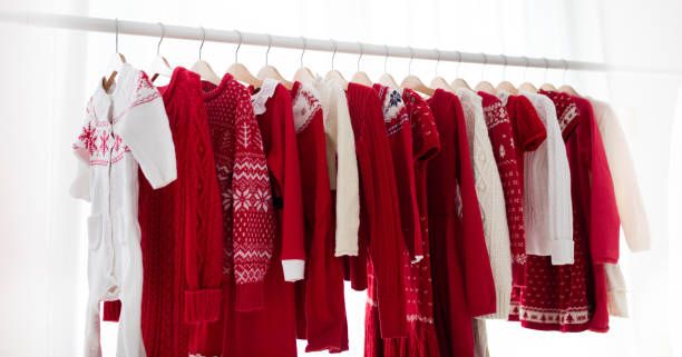 istock Clothes rack with red Christmas knit wear 852834398