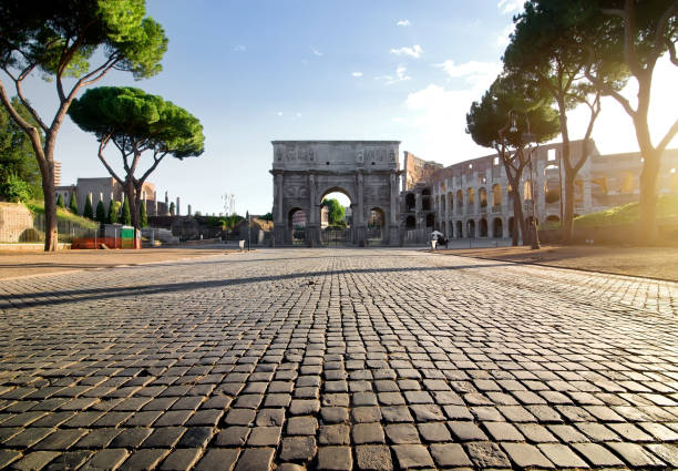 Landmarks of Rome Arc of Constantin and Colosseum in Rome at sunrise, Italy roman empire stock pictures, royalty-free photos & images