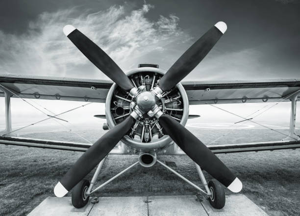 biplane frontview of an historic biplane airplane commercial airplane propeller airplane aerospace industry stock pictures, royalty-free photos & images