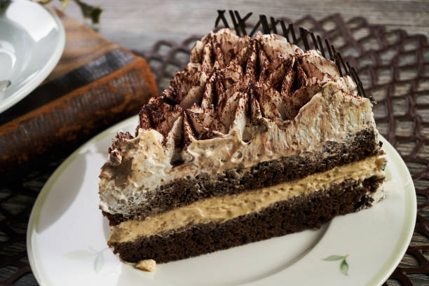 istock Cup of tea and Delicious chocolate cake with whipped cream 852857206