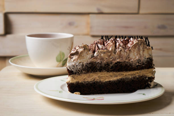 istock Chocolate cake and cup of tea 852893308