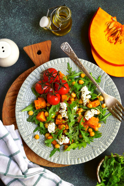 istock Vegetable salad with feta cheese and chickpea 852914120