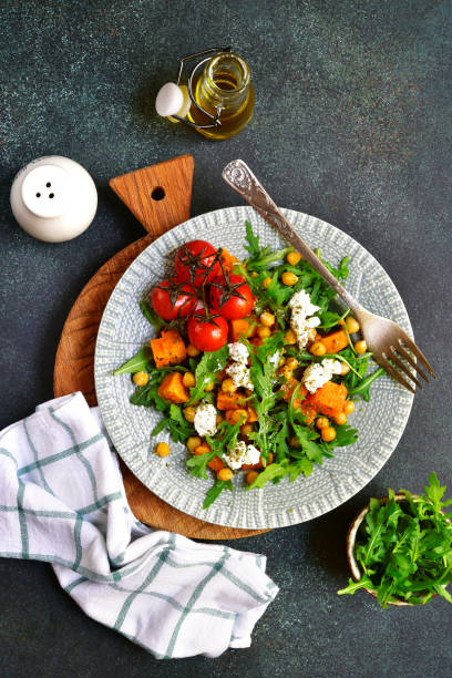istock Vegetable salad with feta cheese and chickpea 852914122