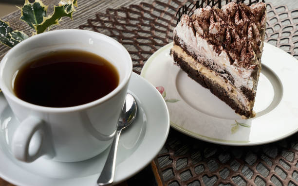 istock Cup of tea and Delicious chocolate cake with whipped cream 852917010