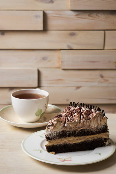 istock Chocolate cake and cup of tea 852921894