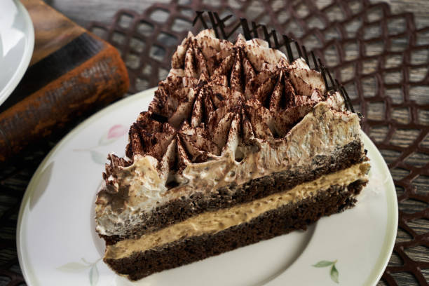 istock Cup of tea and Delicious chocolate cake with whipped cream 852926772