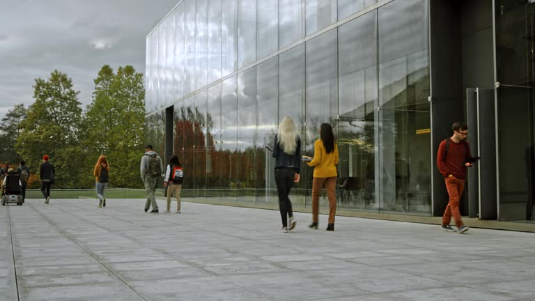 DS Students walking out of the university building