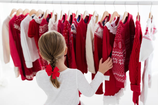 istock Clothes rack with red Christmas knit wear 852952728
