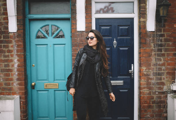 istock Young woman going out to work from her home 852960494
