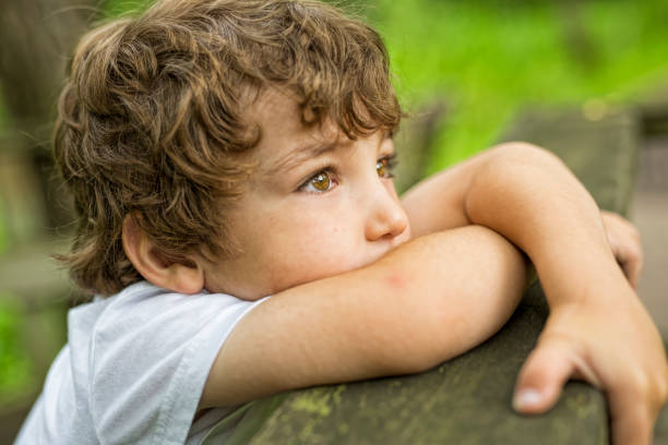 istock Child on a green meadow 852966998