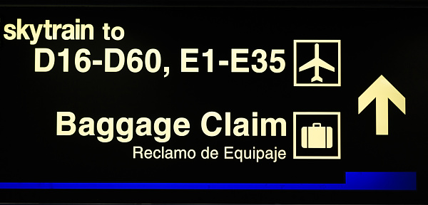 Airport gate and baggage claim sign