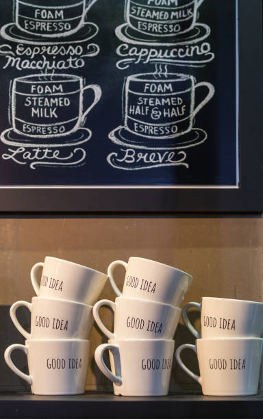 istock Coffee cups with Good Idea wording on the shelf coffee shop 852977254