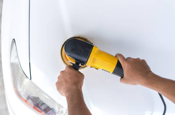 istock Polishing the white car with reflection, car care concept 852977292