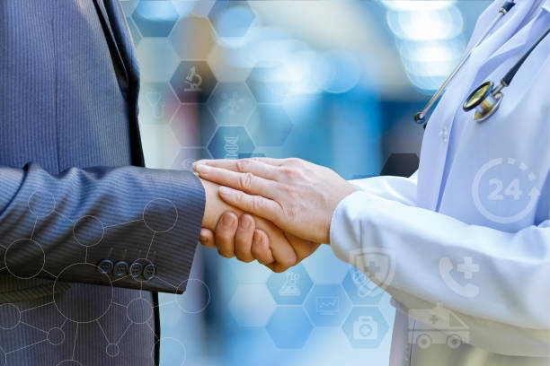 istock Doctor supports the patient's arm . 852977452