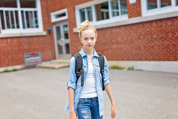 istock Nice Pre-teen boy outside at school having good time 852989052