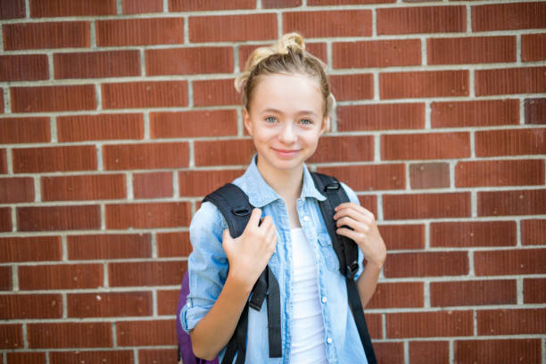 istock Nice Pre-teen boy outside at school having good time 852989864