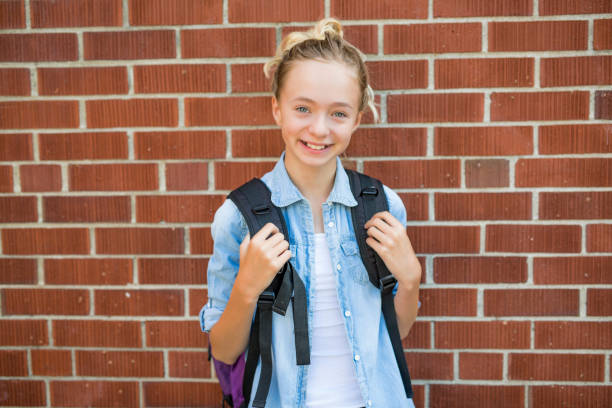 istock Nice Pre-teen boy outside at school having good time 852989918
