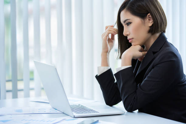 istock Business women are thinking about the work she is doing 852995996