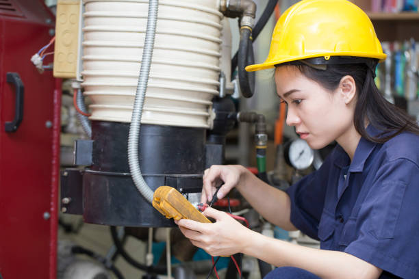 istock young asian woman engineer set up and testing machine in the laboratory factory, engineering and industrial concept 853003720