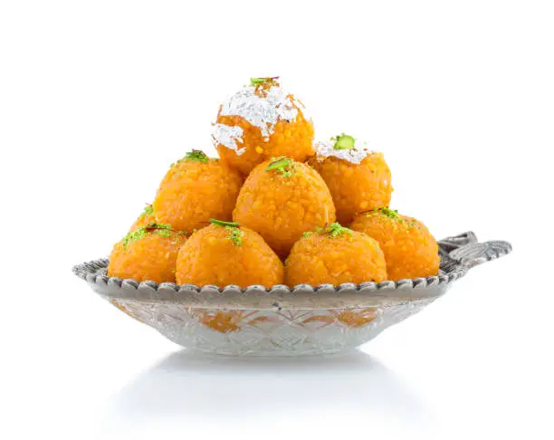 Indian Traditional Laddu Sweet Food Also Know as Motichoor Laddu Dessert isolated on White Background