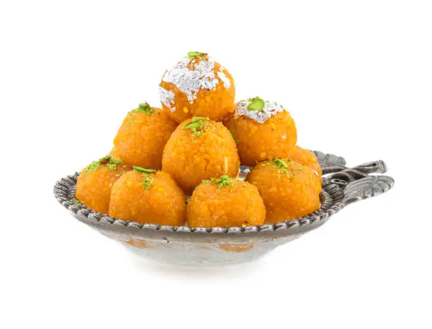 Indian Traditional Laddu Sweet Food Also Know as Motichoor Laddu Dessert isolated on White Background