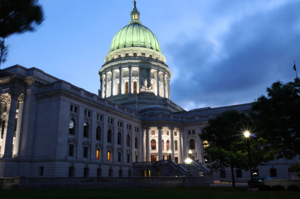 State Capitol building Wisconsin State Capitol building in Madison entrance and dome illuminated in the dusk. wisconsin state capitol photos stock pictures, royalty-free photos & images