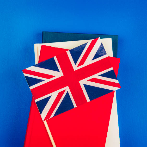 istock Education in England. Books with Union Jack flag 853038362
