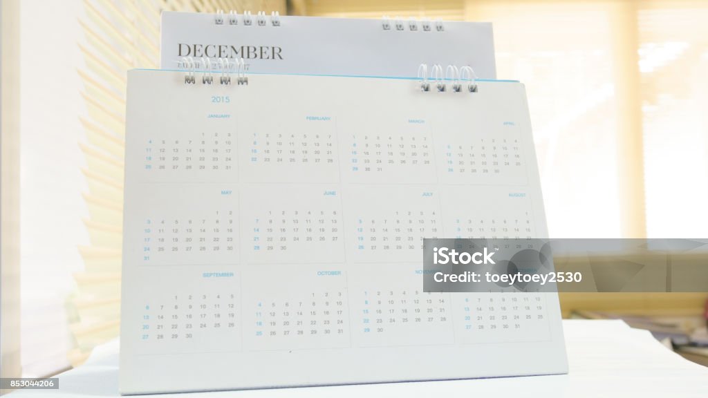 Blurred calendar in white tone. Annual Event Stock Photo