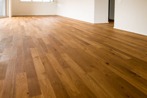 istock wooden parquet floor in a new and empty apartment 853093650