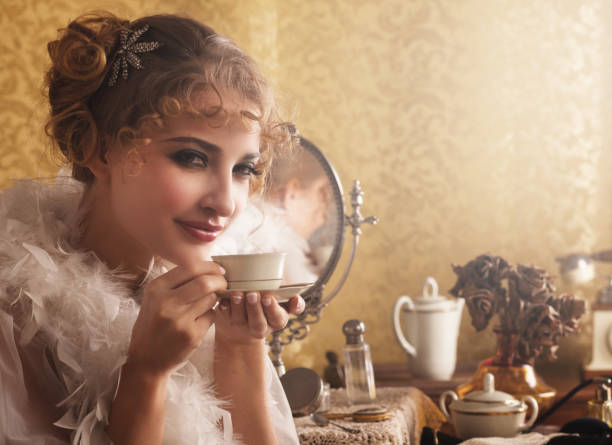 istock Beautiful woman drinking hot coffee 853097296