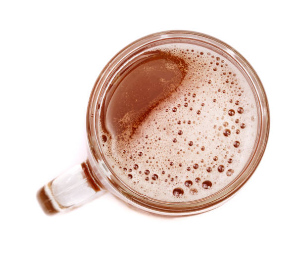 istock glass of beer isolated on white background. Top view 853107710