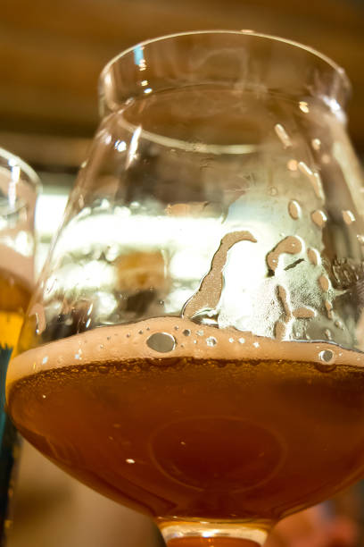 istock a glass of beer in the pub 853112082
