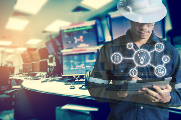 istock Double exposure of Engineer or Technician man with business industrial tool icons while using tablet with monitor of computers room  for oil and gas industrial business concept. 853116130