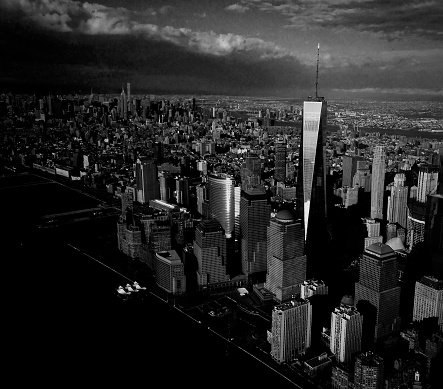 B&W image of New York City's skyline taken from a helicopter.