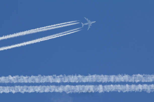 istock Passengers airplane is flying in perfect blue sky 853128978