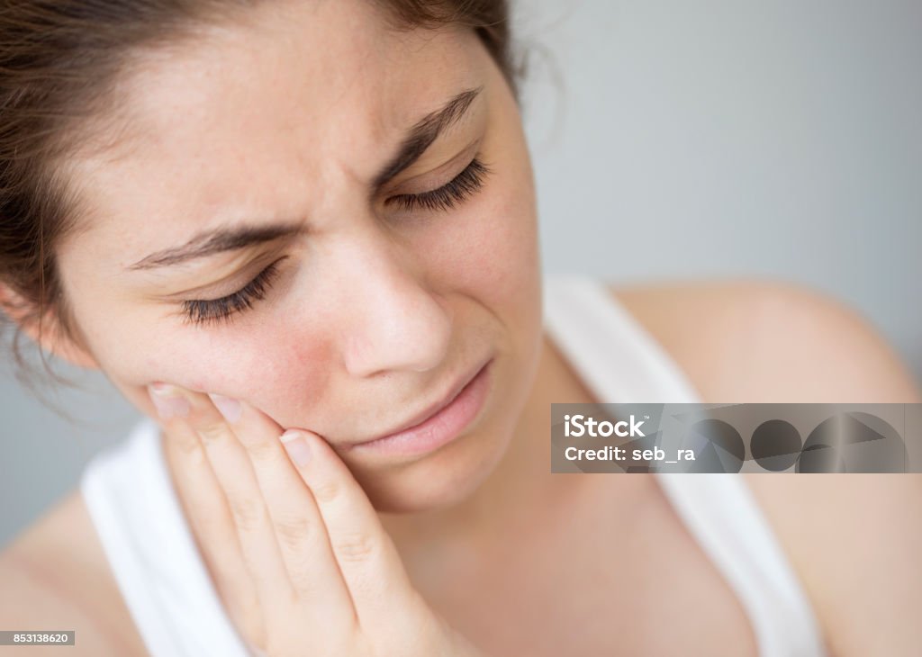 Jeune femme avec Rage de dents - Photo de Douleur libre de droits