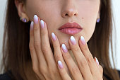 Beautiful woman's nails with beautiful french manicure ombre