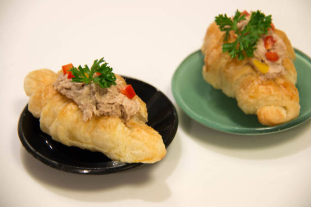 istock Croissant sandwich with  tuna on white 853165072