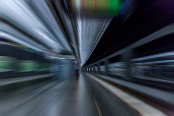 istock subway train passing through station, passengers waiting on the platform 853166230